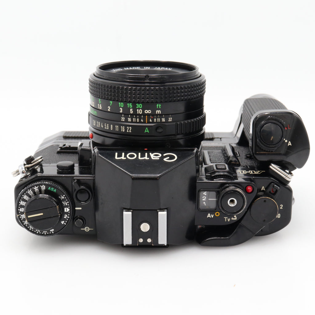 Canon A-1 Gehäuse + motor-drive + FD 50mm F/1.8 gebraucht