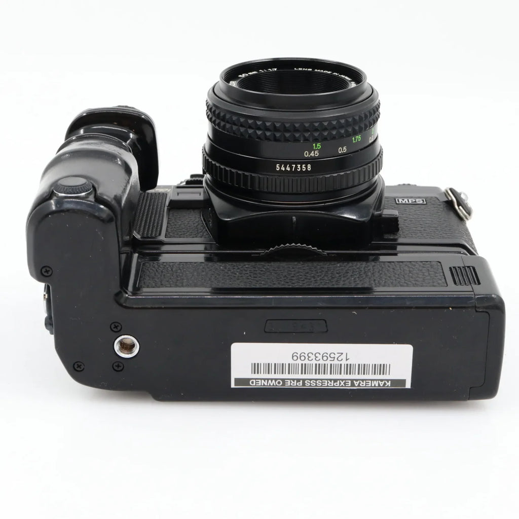 Minolta X-700 body + MD 50mm f/1.7 + Motor Drive 1 used